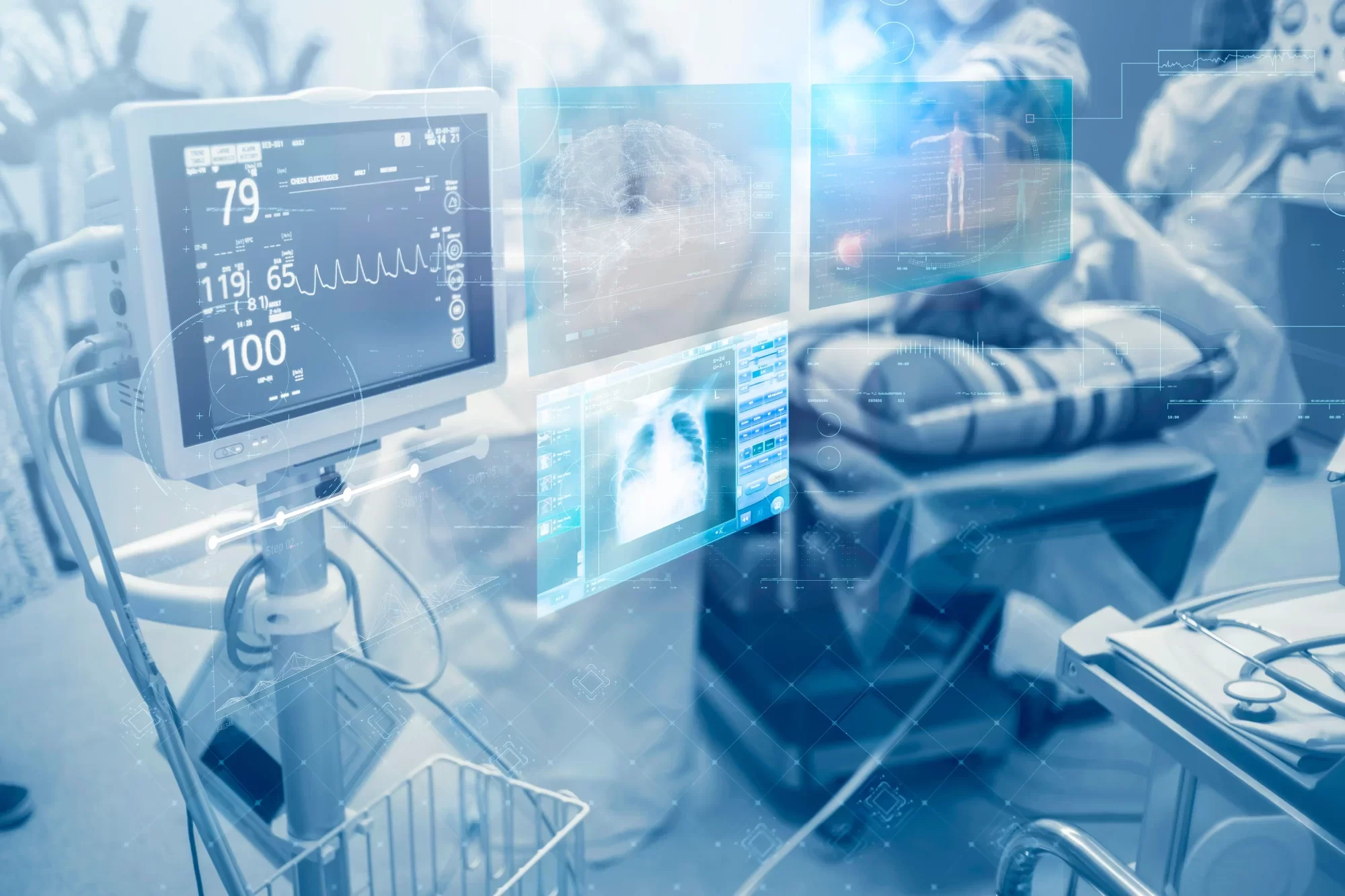 Una sala operatoria con un monitor che mostra dati vitali e tecnologia medica avanzata.